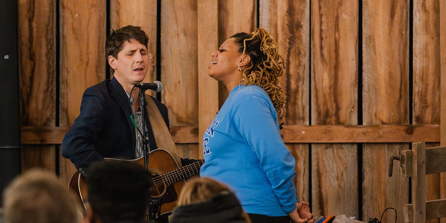 People gathering for a live Pray As You Go concert.